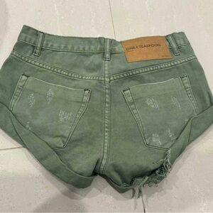 one teaspoons 
size 24 
green shorts
never worn